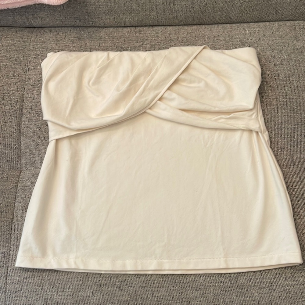 Sleeveless cream blouse